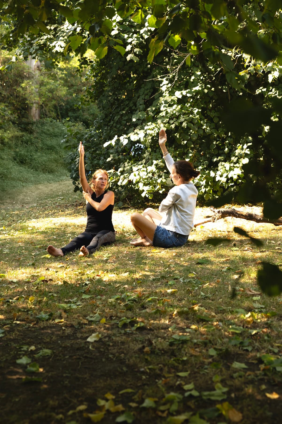 People practising body-led movement in a workshop